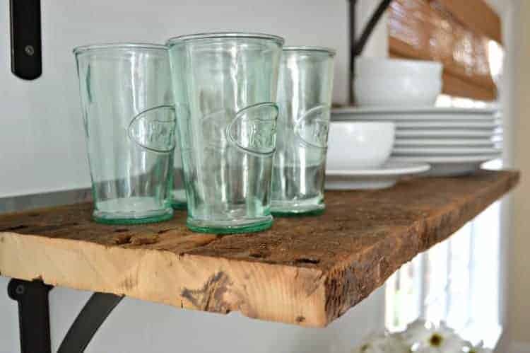 How to install beautiful DIY open shelving in the kitchen for under $50. A great way to add rustic, farmhouse charm instead of cabinets in the kitchen. www.chatfieldcourt.com