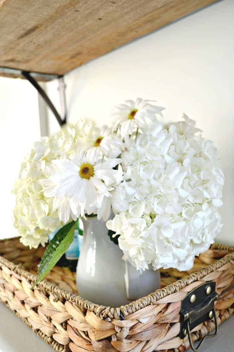 How to hang beautiful DIY kitchen open shelving for under $50. A great way to add rustic, farmhouse charm instead of cabinets in the kitchen. www.chatfieldcourt.com