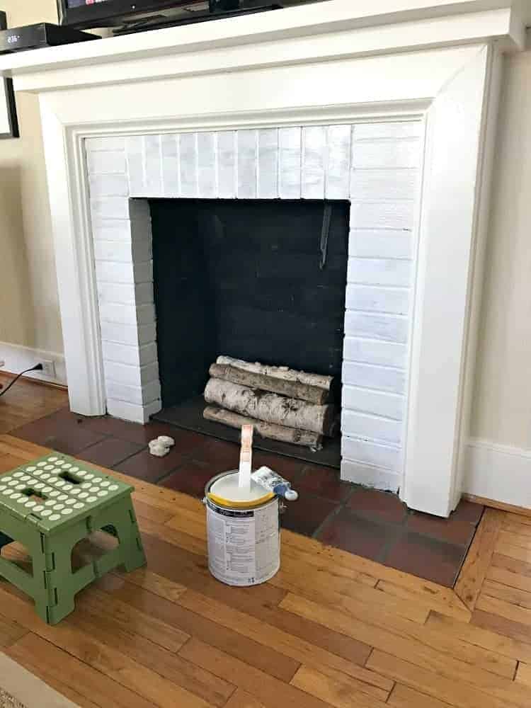 first coat of paint on fireplace surround