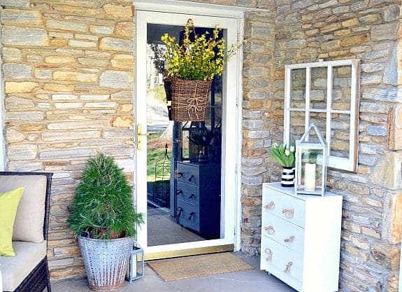 A spring wreath hanging on a front door