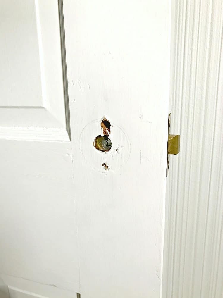 hole in door where old glass knob was installed