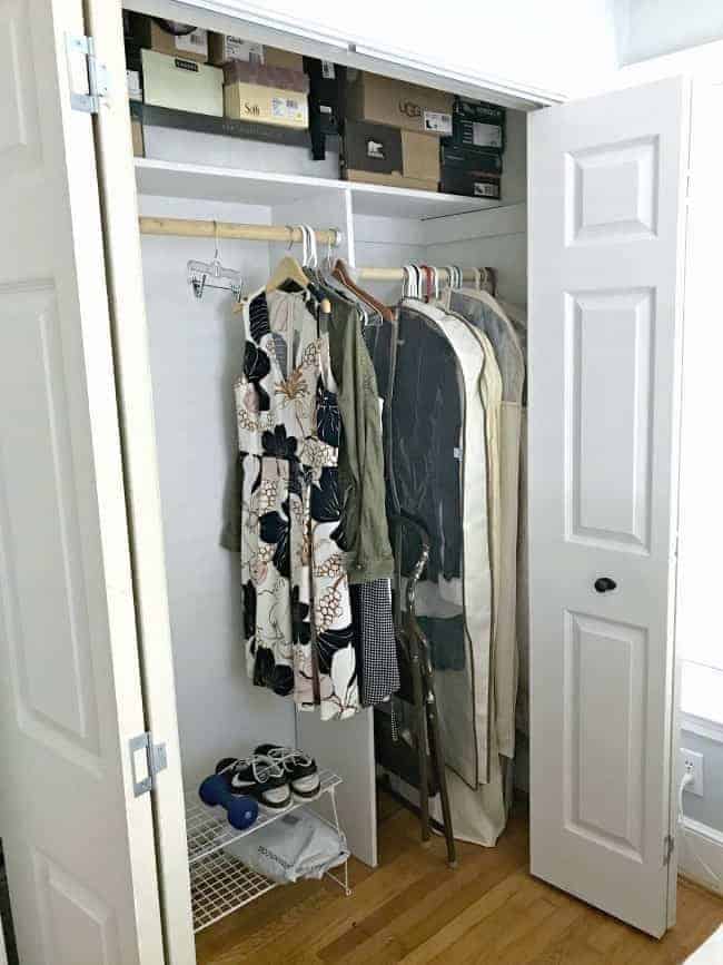 Small bedroom closet turns into a small powder room.