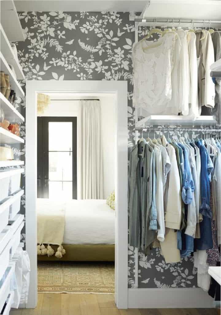 gray flowered wallpaper in large closet