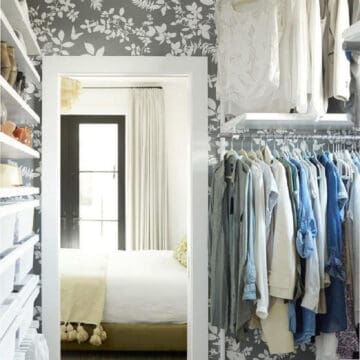 gray flowered wallpaper in large closet