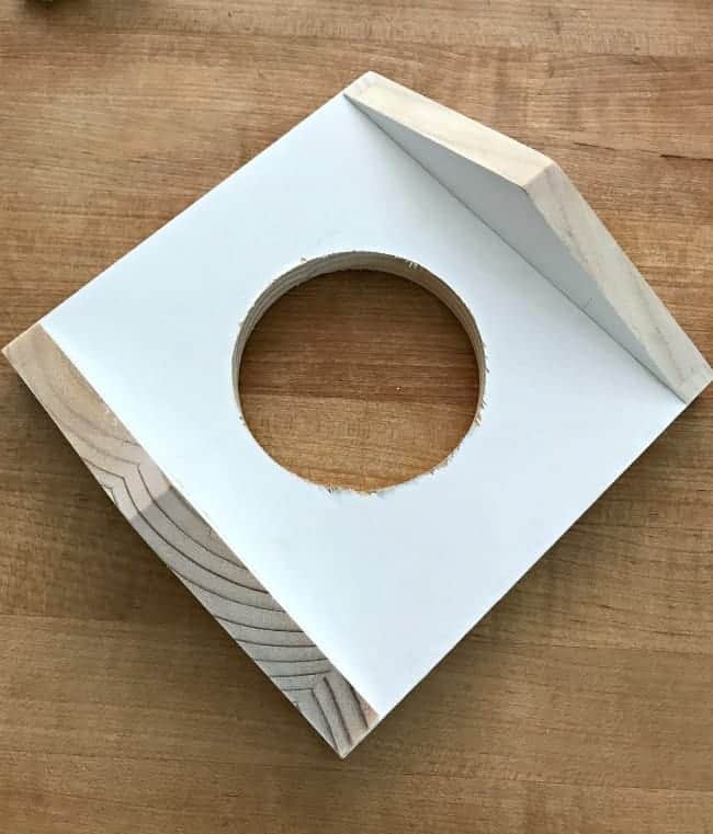 A DIY adapter box to cover the ceiling hole from the fan.