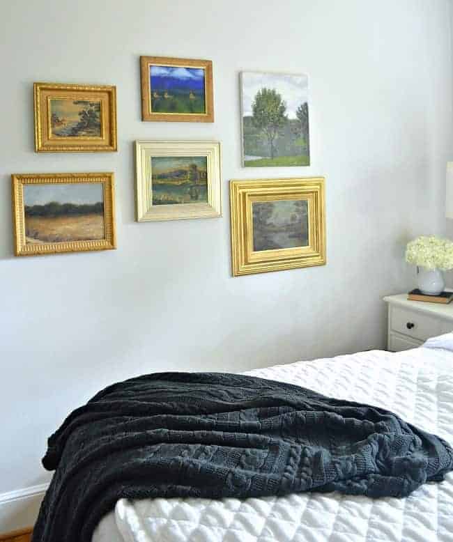 How to use thrift store art to make a gallery wall in any room in your home.