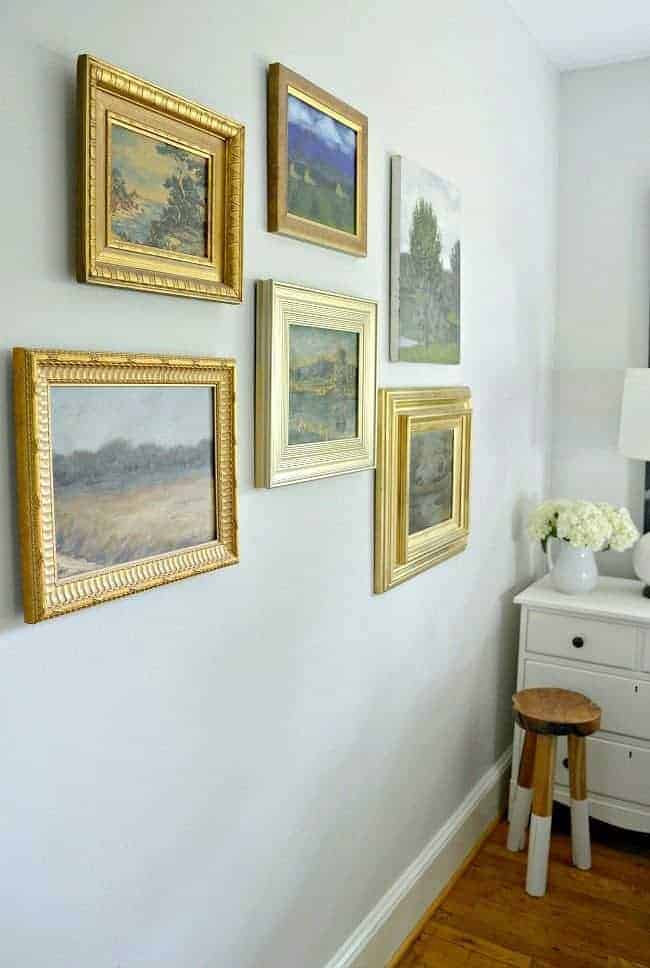 Creating a wall gallery with thrift store art for cottage musings for September