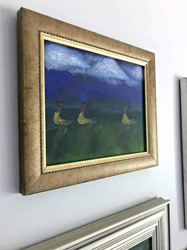 Finding and using thrift store art to make a gallery wall in any room in your home.