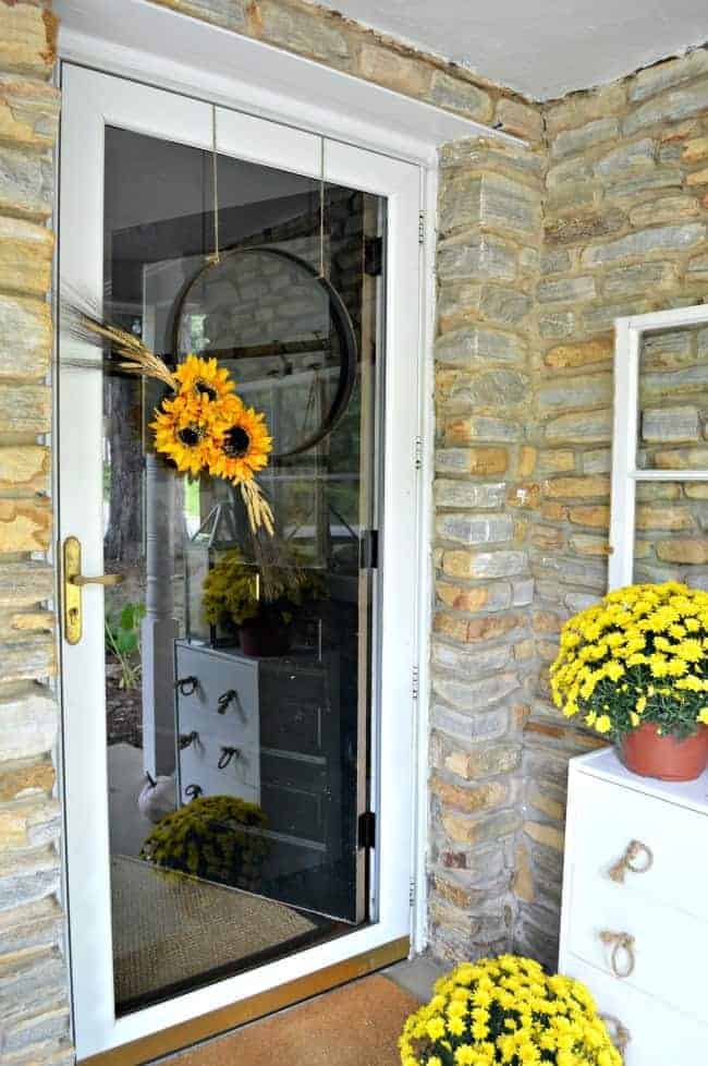 How to make this simple fall hoop wreath for your front door.