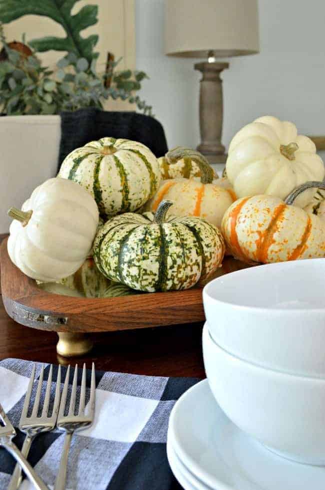 fall centerpiece with pumpkins