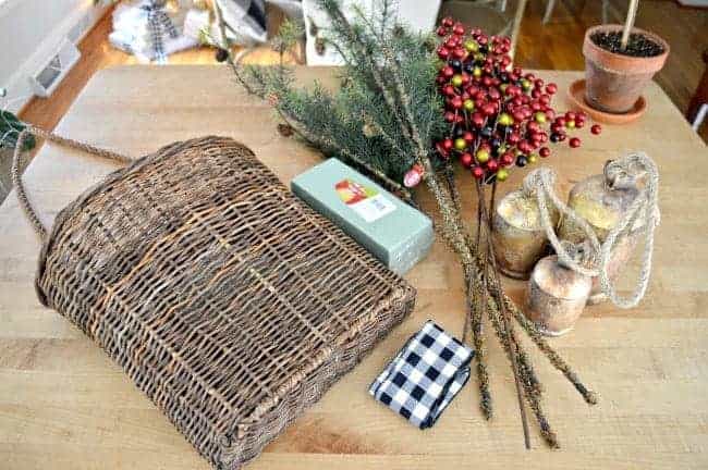 Create a simple DIY Christmas front door basket, with just a few supplies, to add holiday color to your front door.