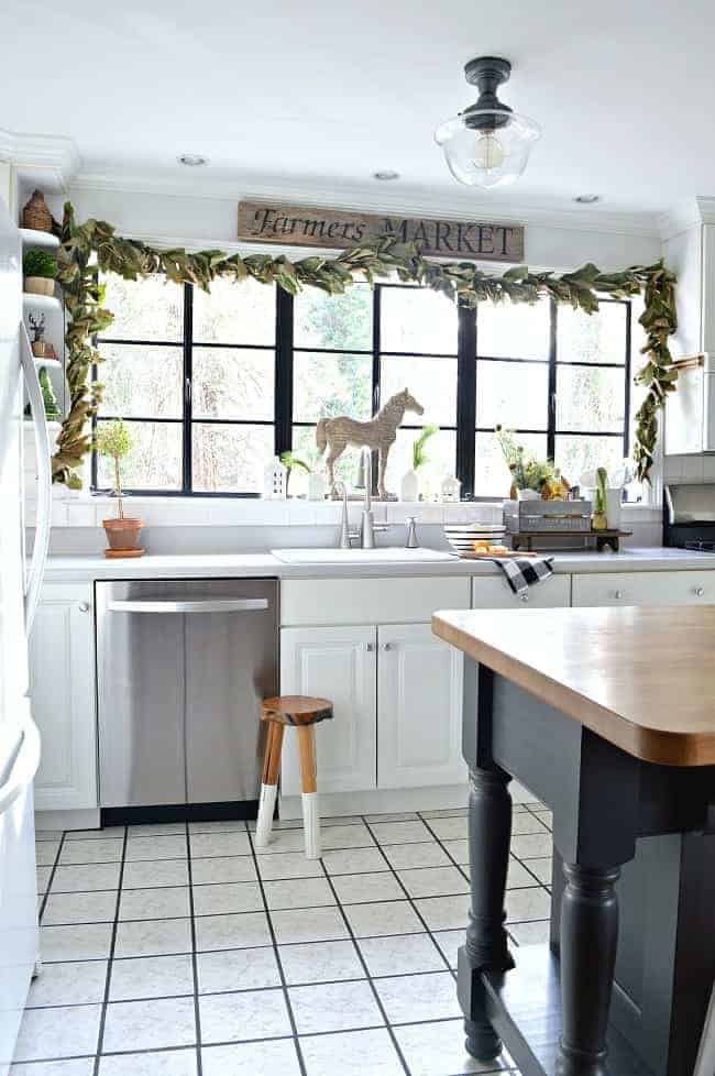 A cozy cottage Christmas kitchen with tons of farmhouse decorating ideas.