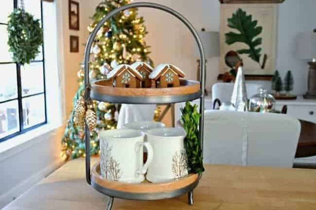 How to create a cozy cottage Christmas kitchen by using farmhouse touches like a two tiered tray for coffee essentials.