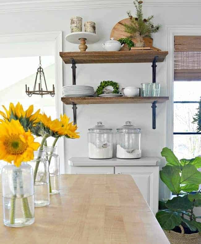 An update on our cottage kitchen in our 1946 stone house that we moved into 18 months ago. We did everything from new appliances to barn wood shelves.