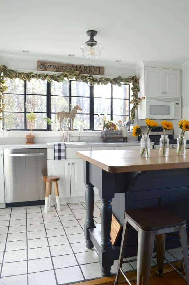 An update on our cottage kitchen in our 1946 stone house that we moved into 18 months ago. We did everything from new appliances to new paint to a DIY barn wood sign.