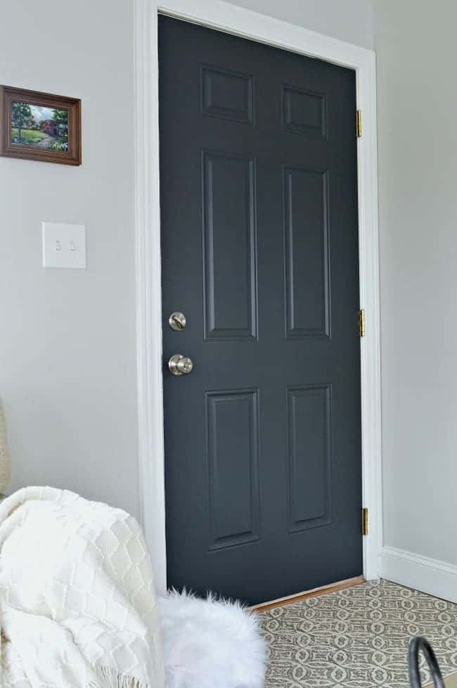 sunroom back door painted in a dark gray paint