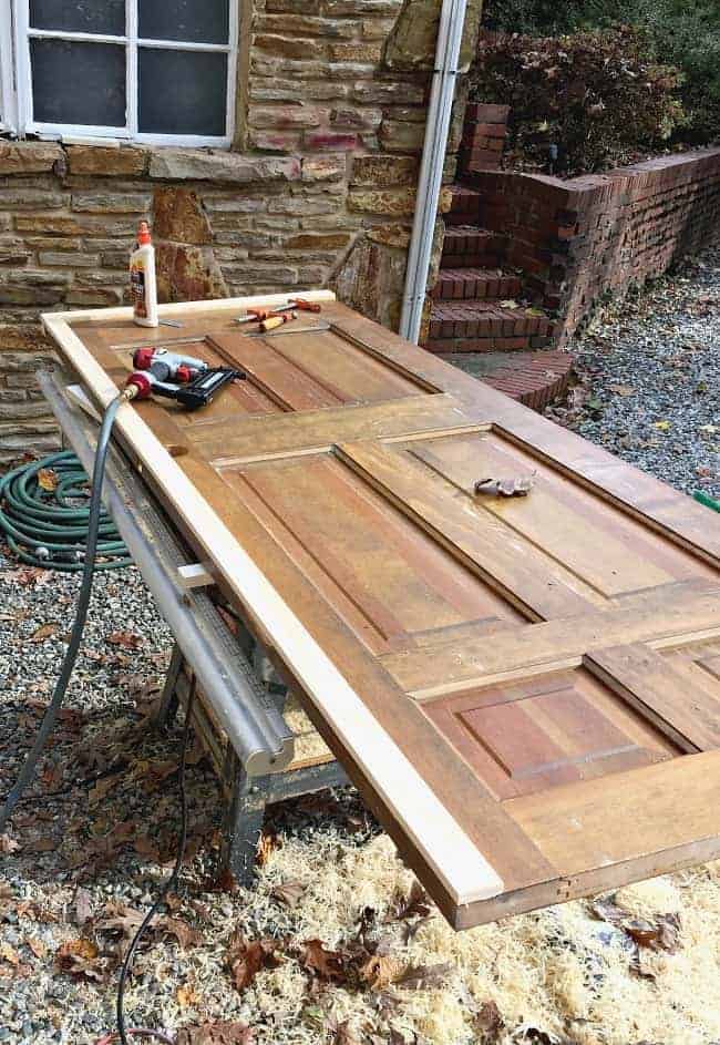 adding wood to beef up an old wood door