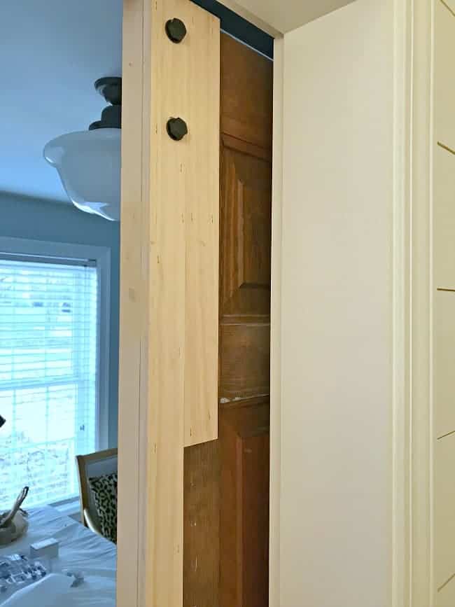 boards attached to wood closet door