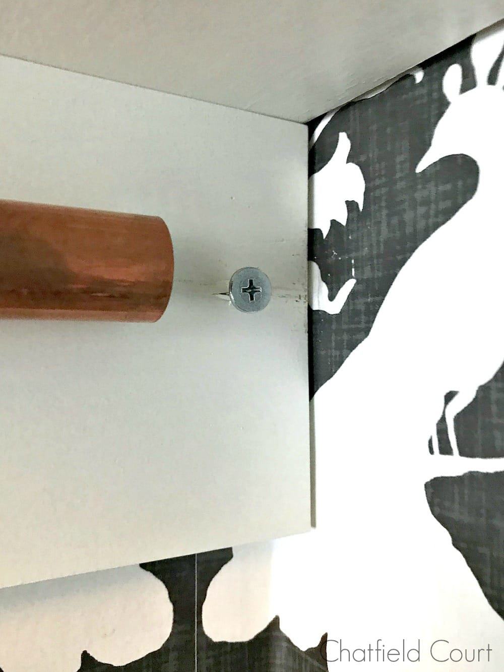 screw in wood board by copper pipe