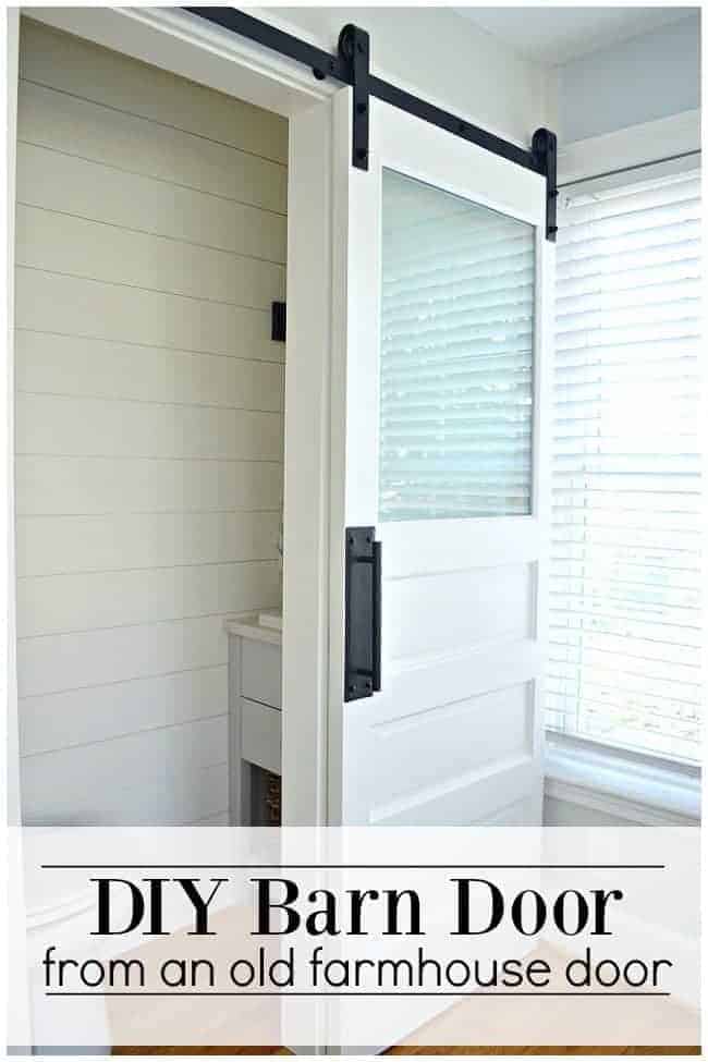 frosted glass bathroom door and window taped with painter's tape and frosted 