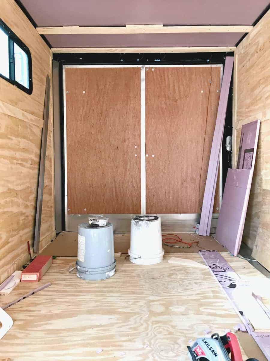 rear doors in a landscape trailer and insulation and wood supports in ceiling