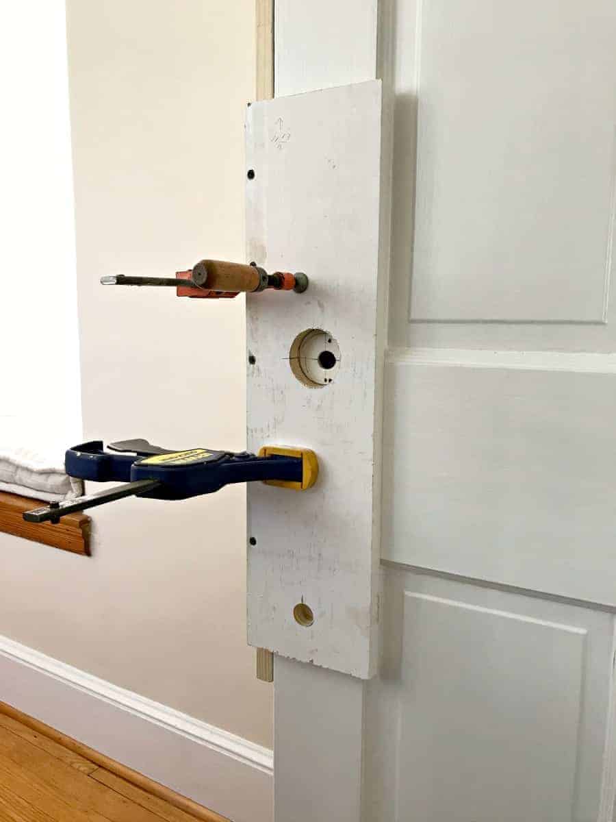 wood jig and clamps on old wooden door