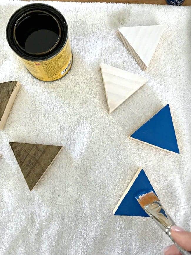 painted and stained wood triangles