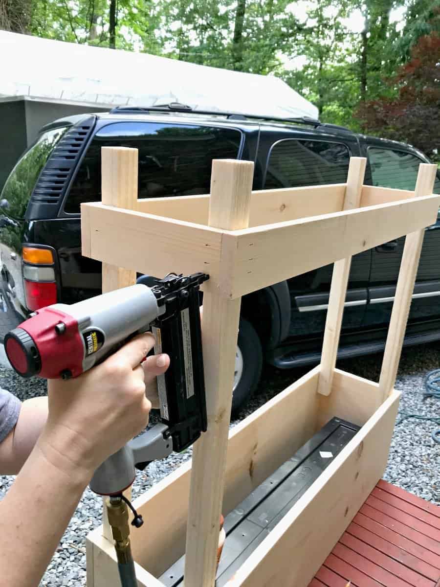 nailing shelf on bottom of DIY wood planter