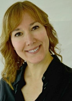 A woman smiling for the camera