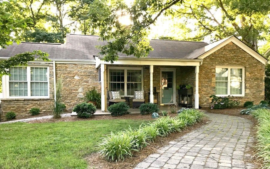 cottage musings for June 2018 and stone cottage ranch with covered front porch and brick walkway