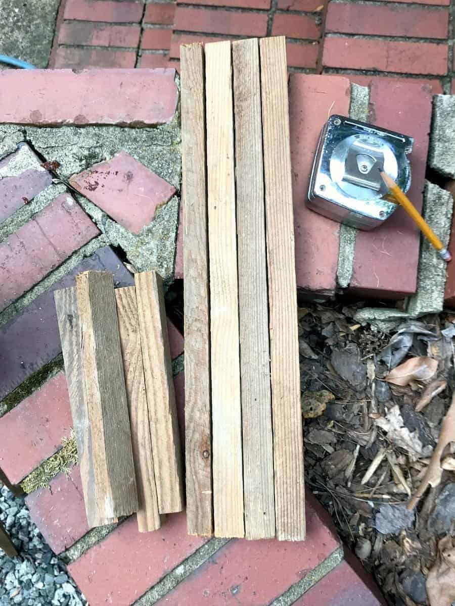 tobacco sticks cut to length to make a wooden garden obelisk