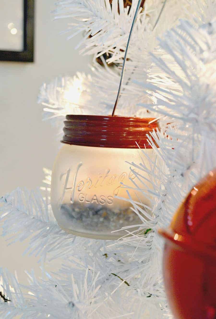 mini DIY mason jar lanterns hanging in white Christmas tree