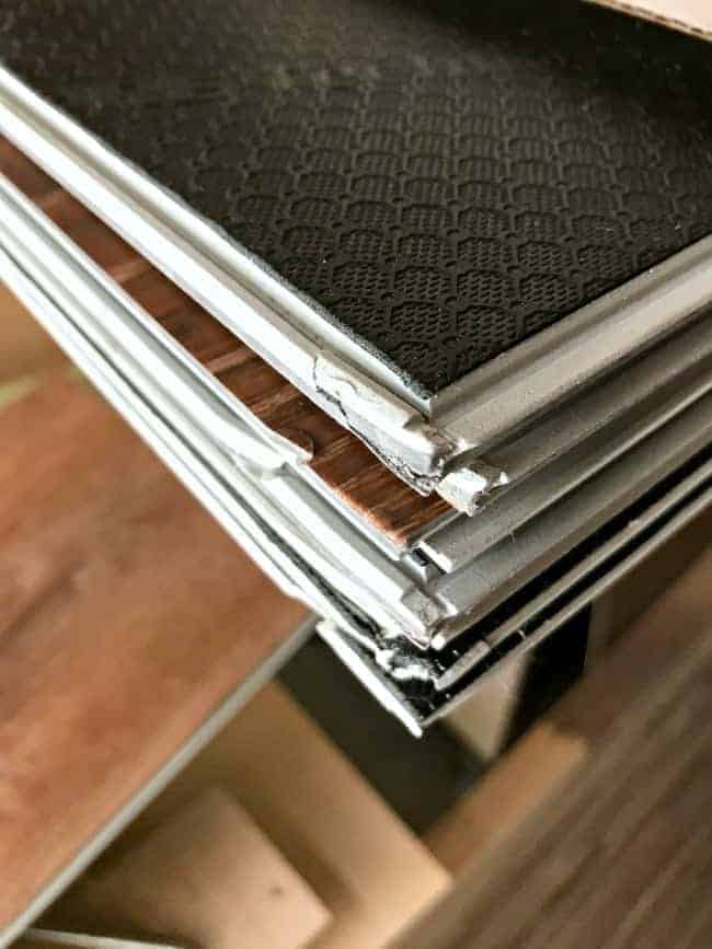 How to Install Vinyl Flooring damaged planks shot damaged ends of vinyl plank flooring