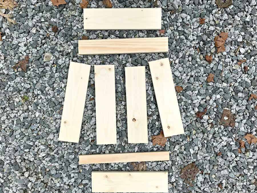 cut pieces of pine used to make a wall mounted coat rack