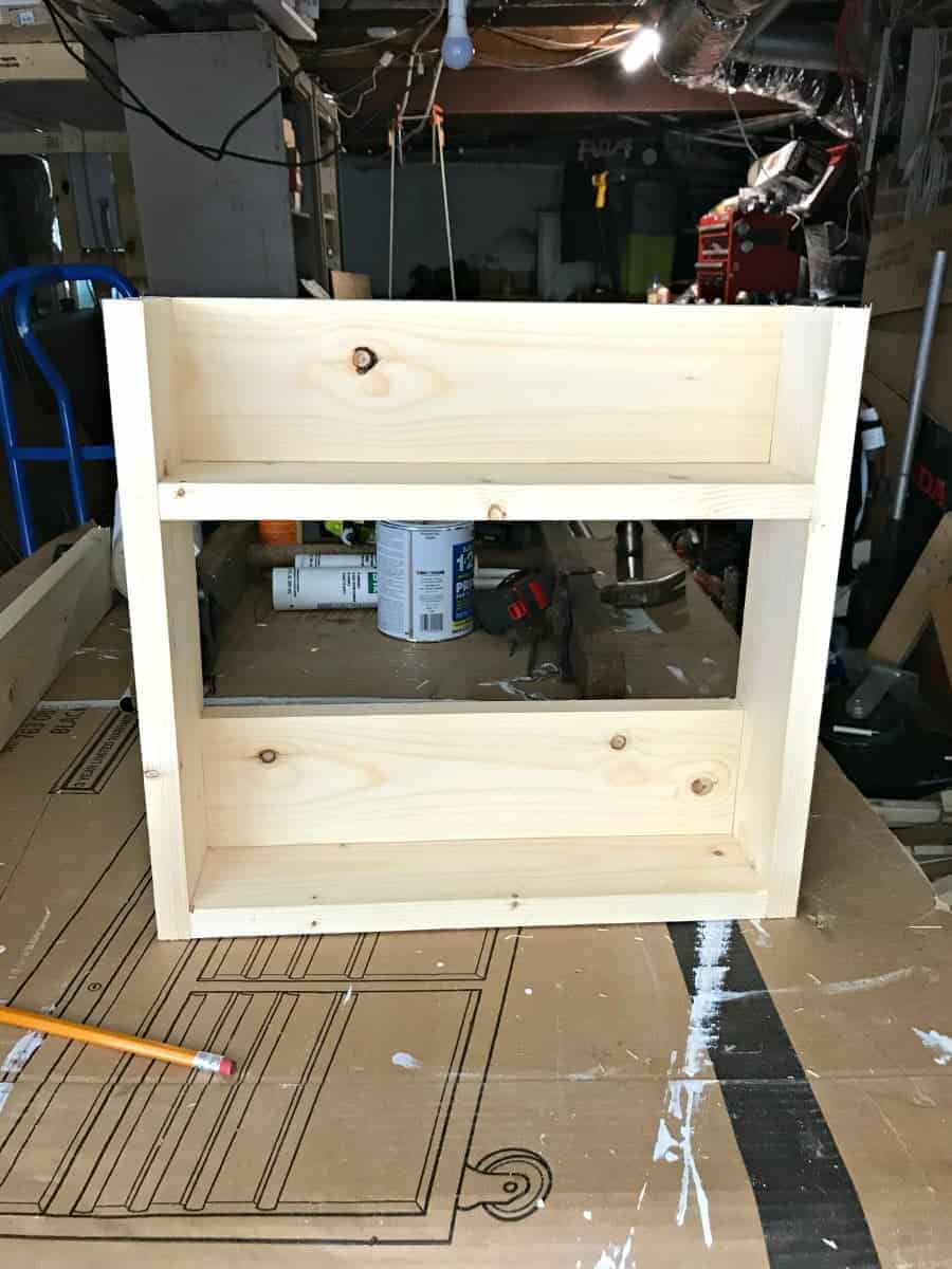 completed pine wall mounted coat rack with shelves