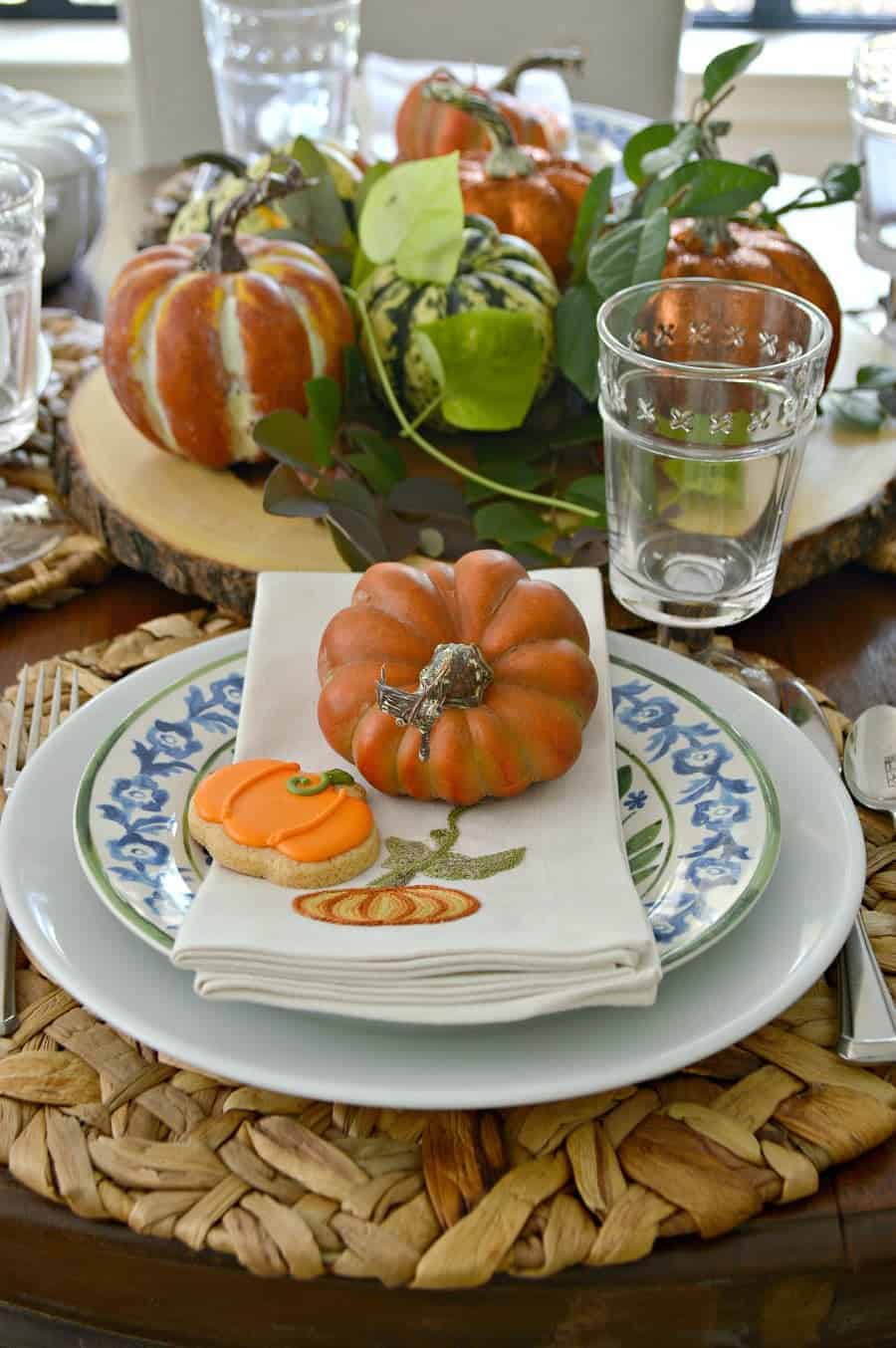 fall place setting with pumpkins