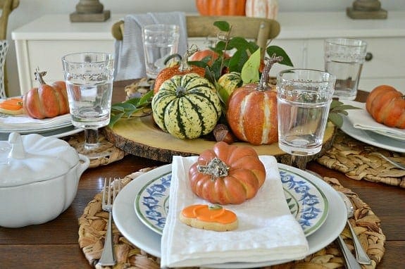 A table set with fall decor 