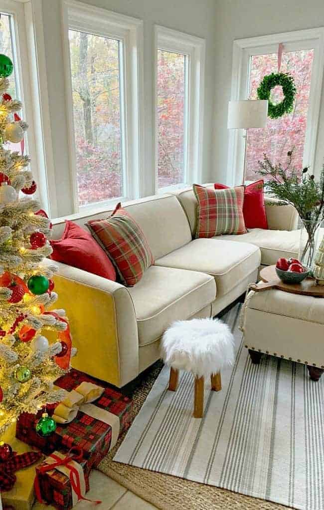 A Traditional Cottage Christmas Sunroom In Red And Green