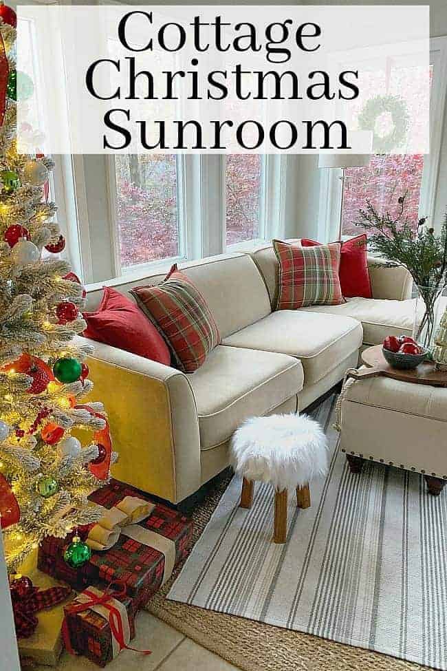 sunroom with sofa decorated for Christmas