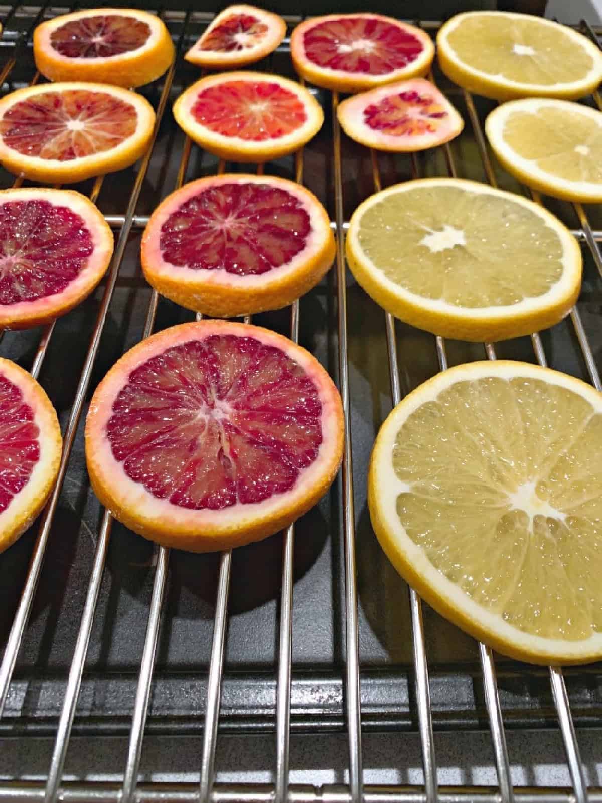 DIY Dried Orange Slice Ornaments pic sliced oranges on baking rack