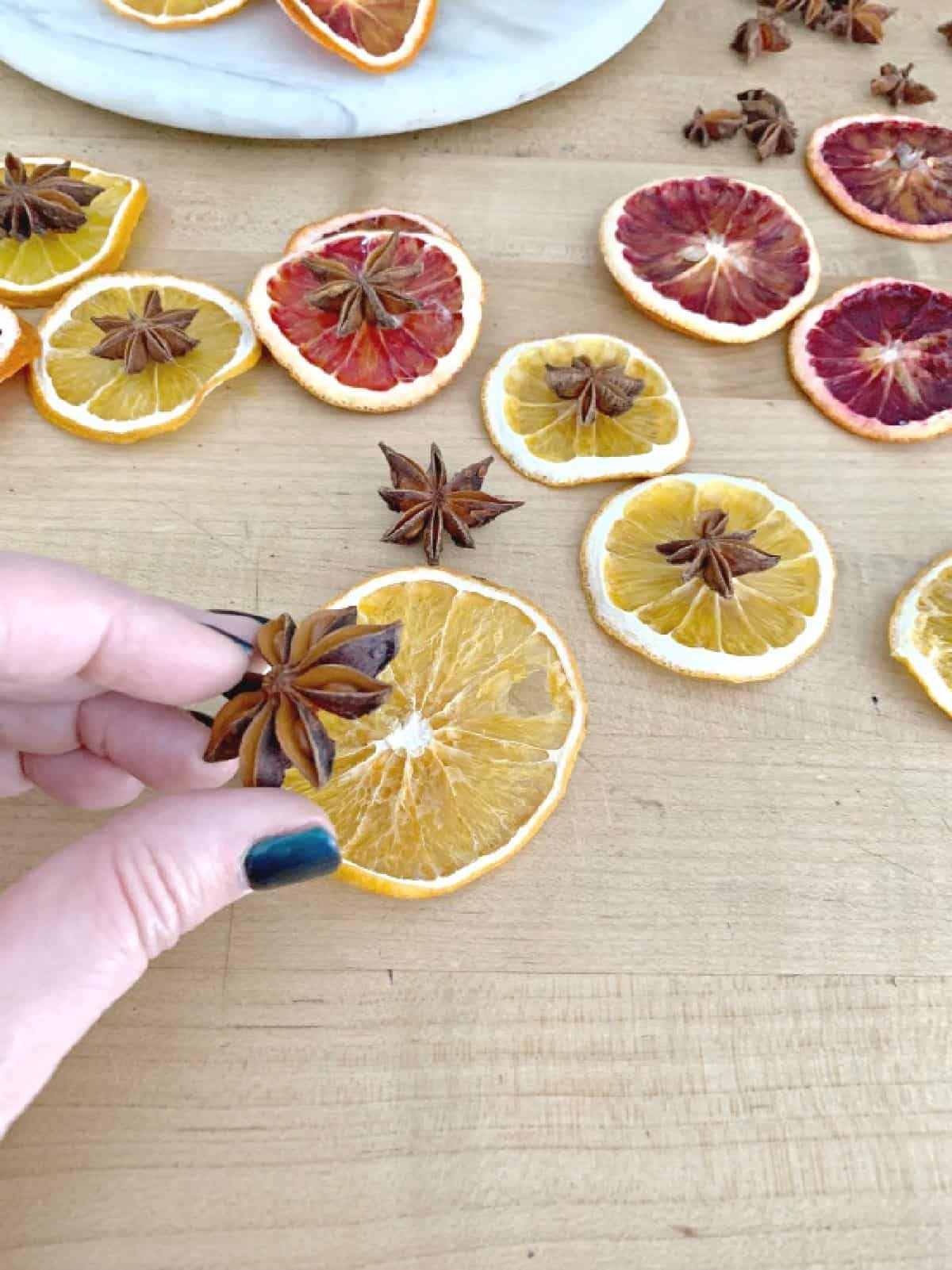 DIY Dried Orange Slice Ornaments image star anise and dried orange slices