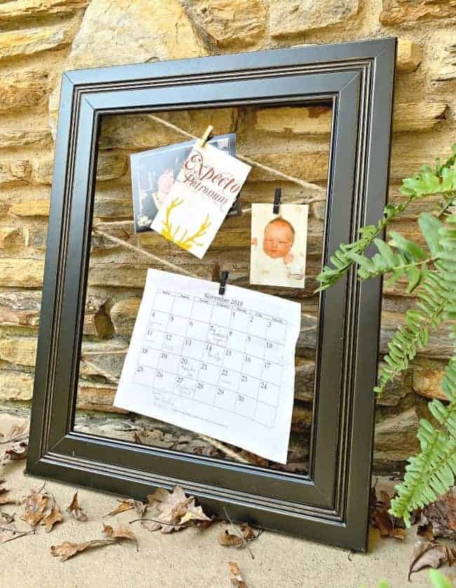 DIY memo board made with twine and large black frame 