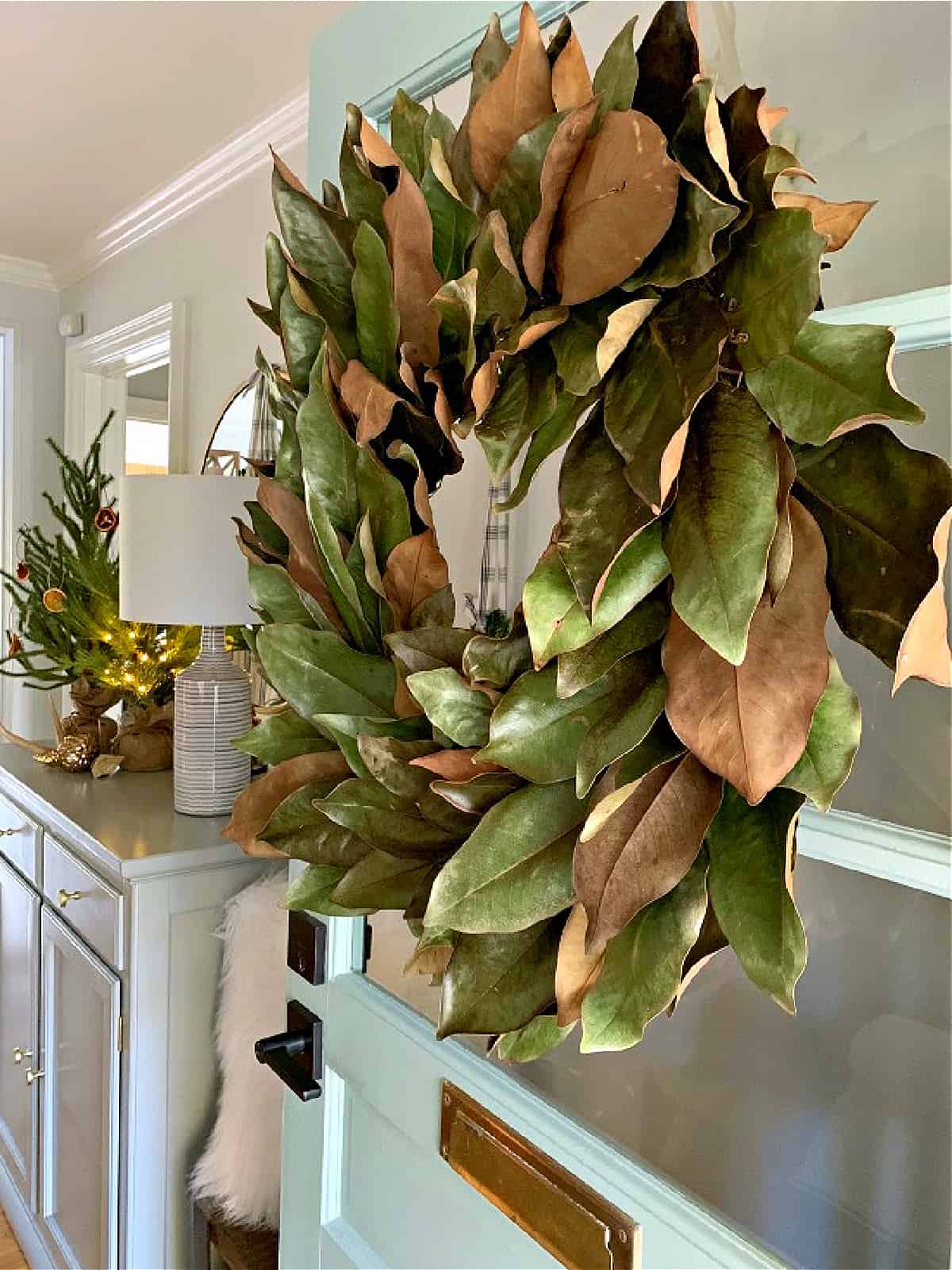 magnolia leaf wreath on door