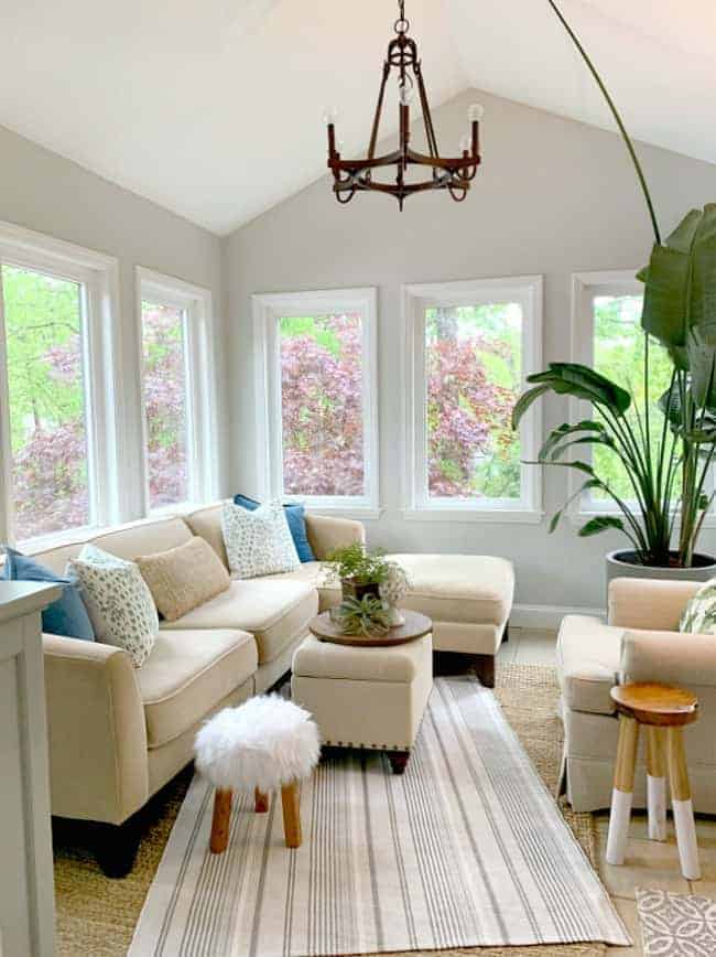 large neutral sectional in sunroom 