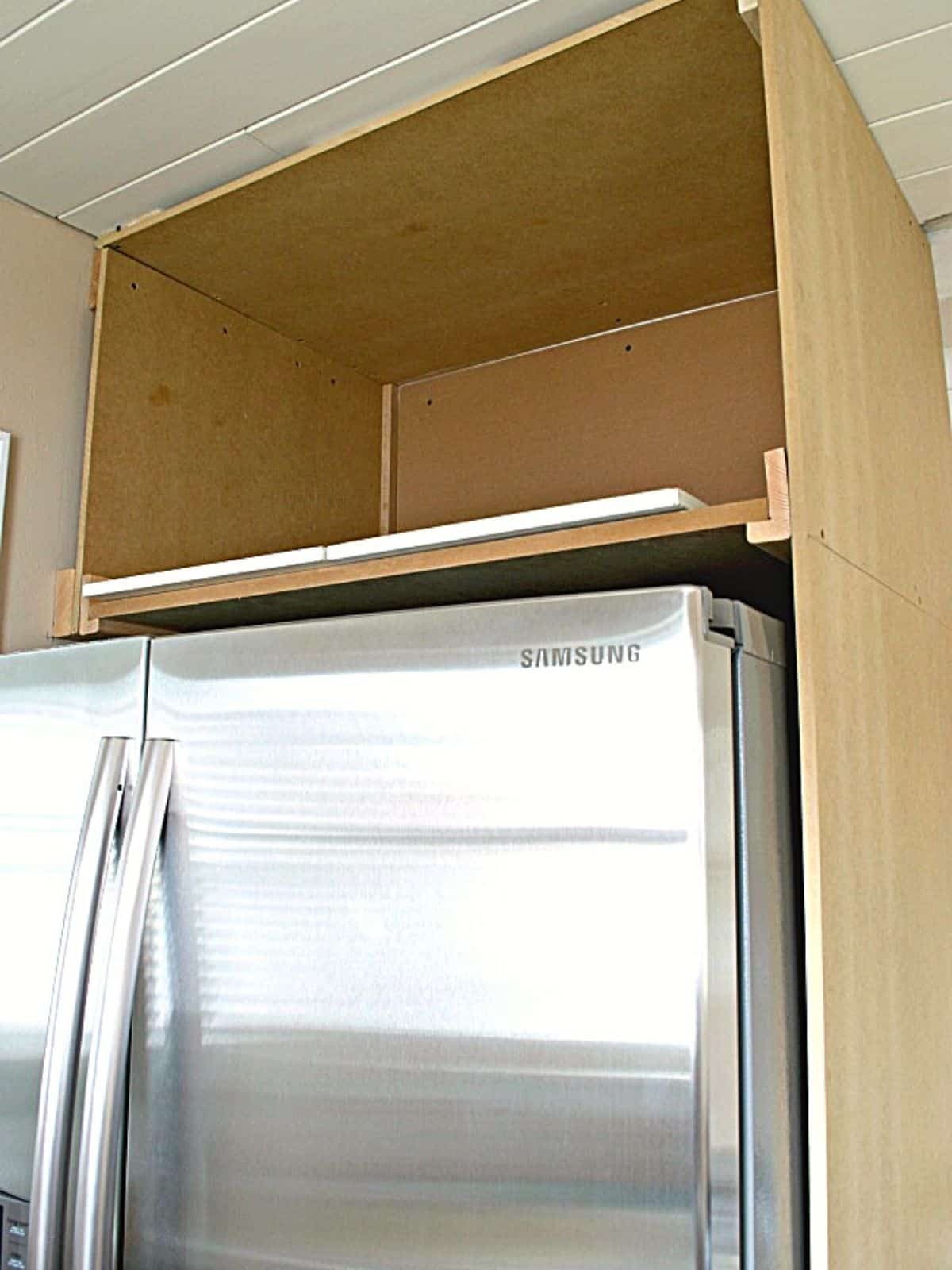 framed refrigerator cabinet 