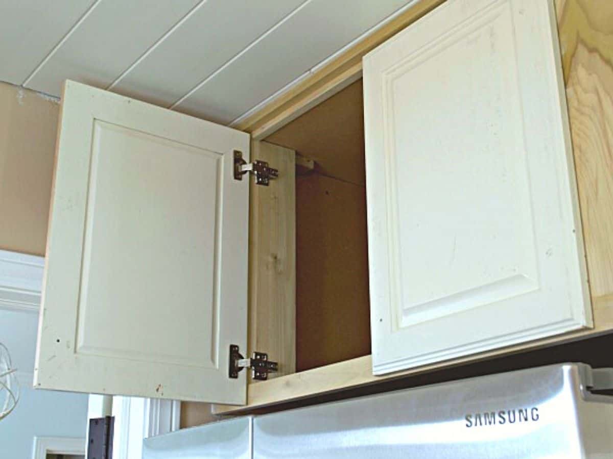 cabinet doors on refrigerator cabinet