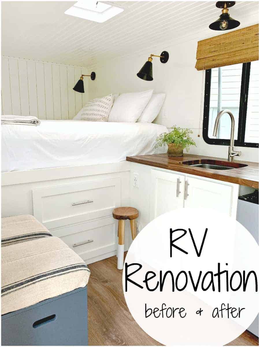 RV renovation after shot of a big white bed and kitchen sink, with a stool next to it.