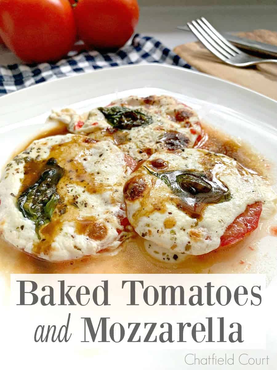 3 baked tomatoes and mozzarella on a dish with a large graphic