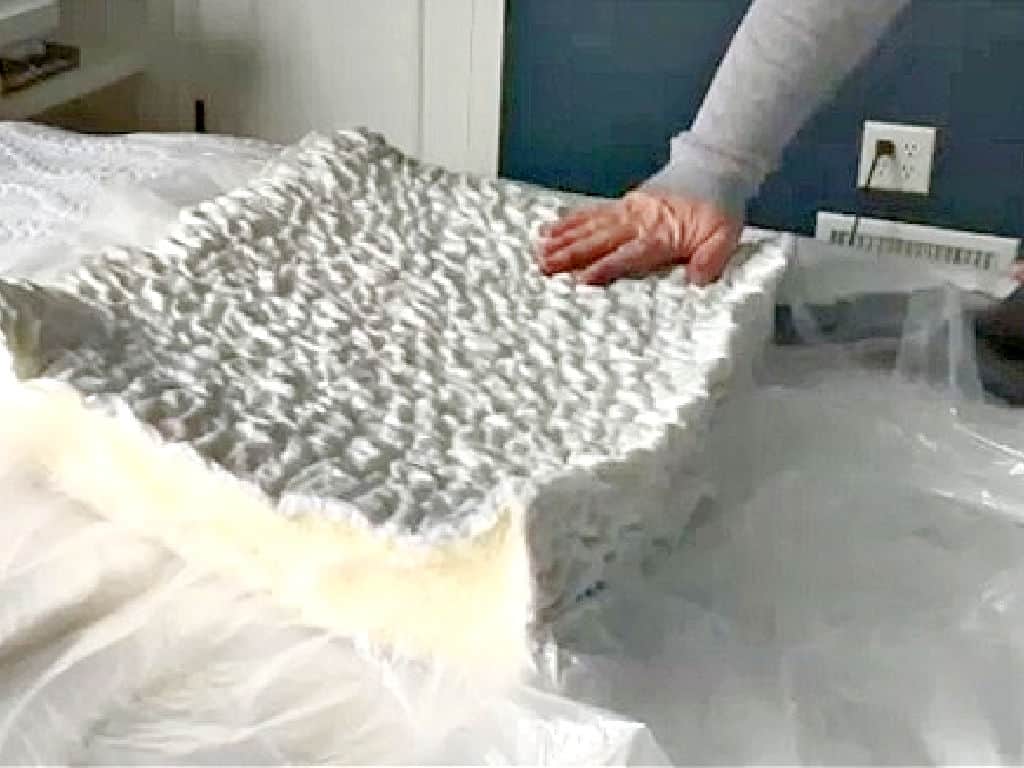 using a vacuum to shrink a cushion