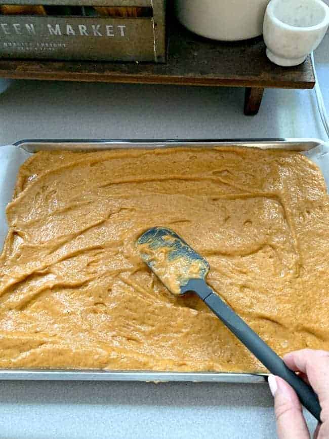 spreading cake batter in jelly roll pan